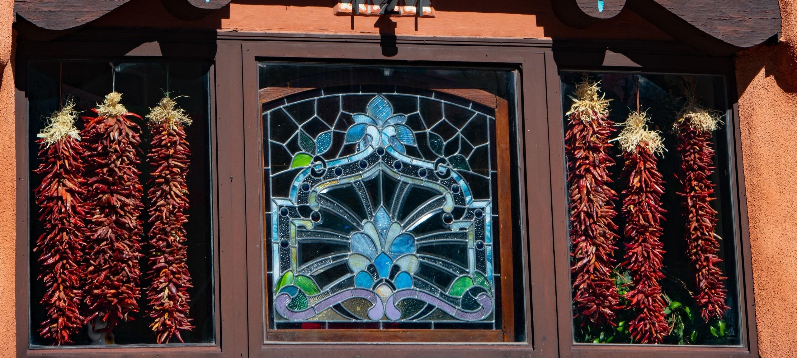 Exterior of historic home stained glass window, Santa Fe